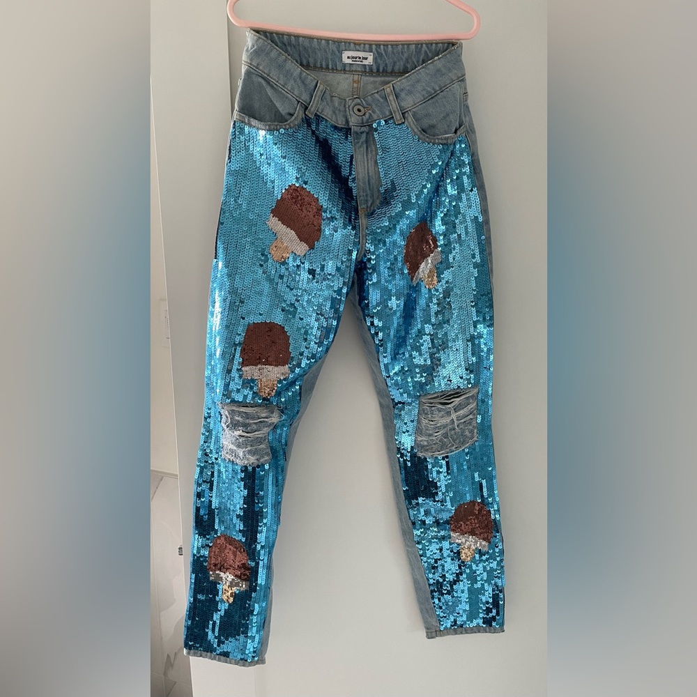 An Italian made brand new  “au jour le jour” Sequinned Ripped Blue Denim Jeans